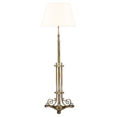 An Early 20th Century Arts and Crafts Brass Telescopic Standard Lamp