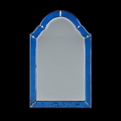An Early 20th Century Blue Glass Art Dec Arched Mirror.