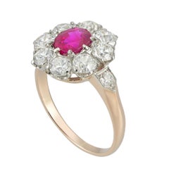 An early 20th century Burmese ruby and diamond cluster ring