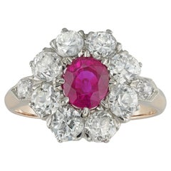An early 20th century Burmese ruby and diamond cluster ring