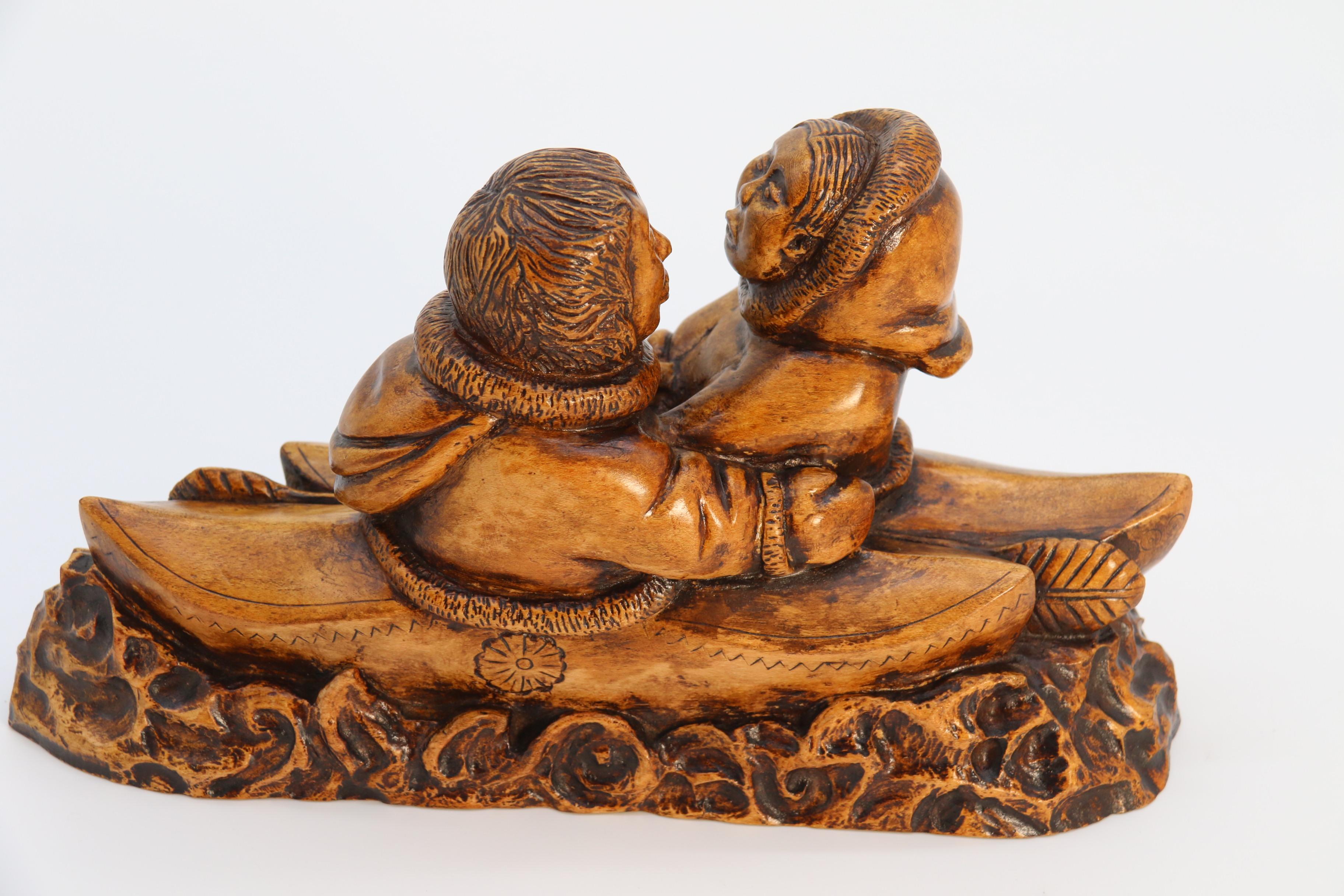 An early 20th century Canadian folk art maple wood carved Inuit figure group For Sale 9