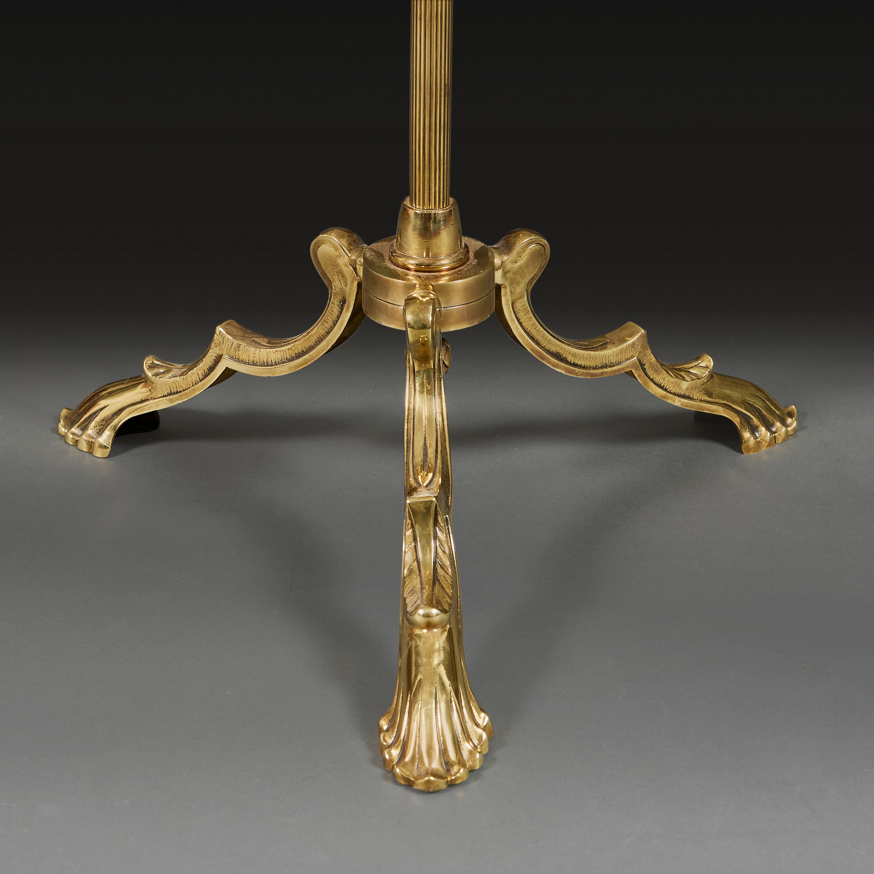 English An early 20th century Edwardian brass standard lamp