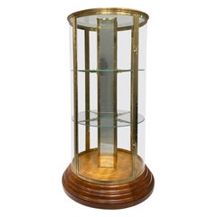 An early 20th century English round freestanding  display cabinet.