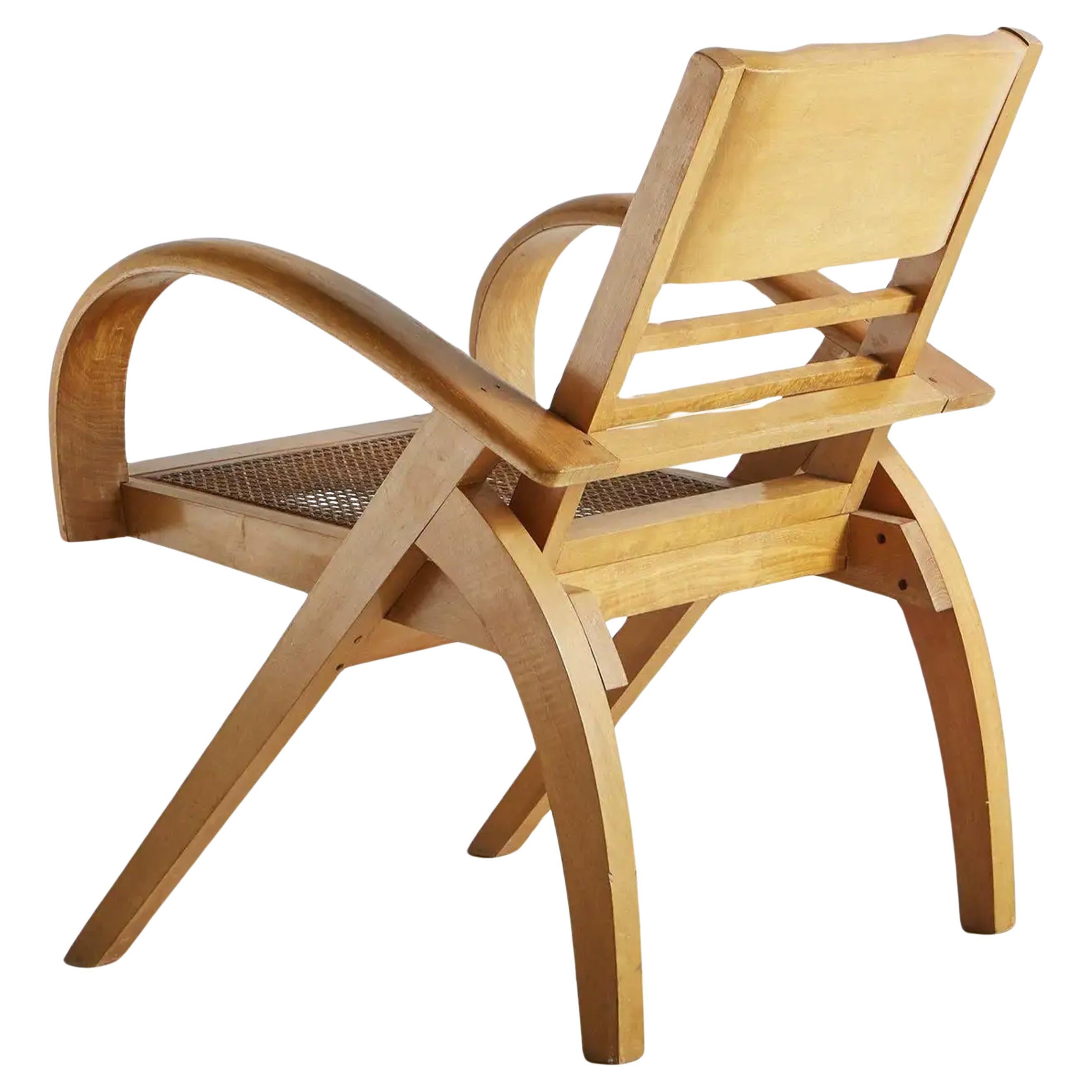 Französischer klappbarer Art-déco-Sessel aus Seidenholz und Schilfrohr aus dem frühen 20. Jahrhundert 1920er Jahre (Geflecht) im Angebot