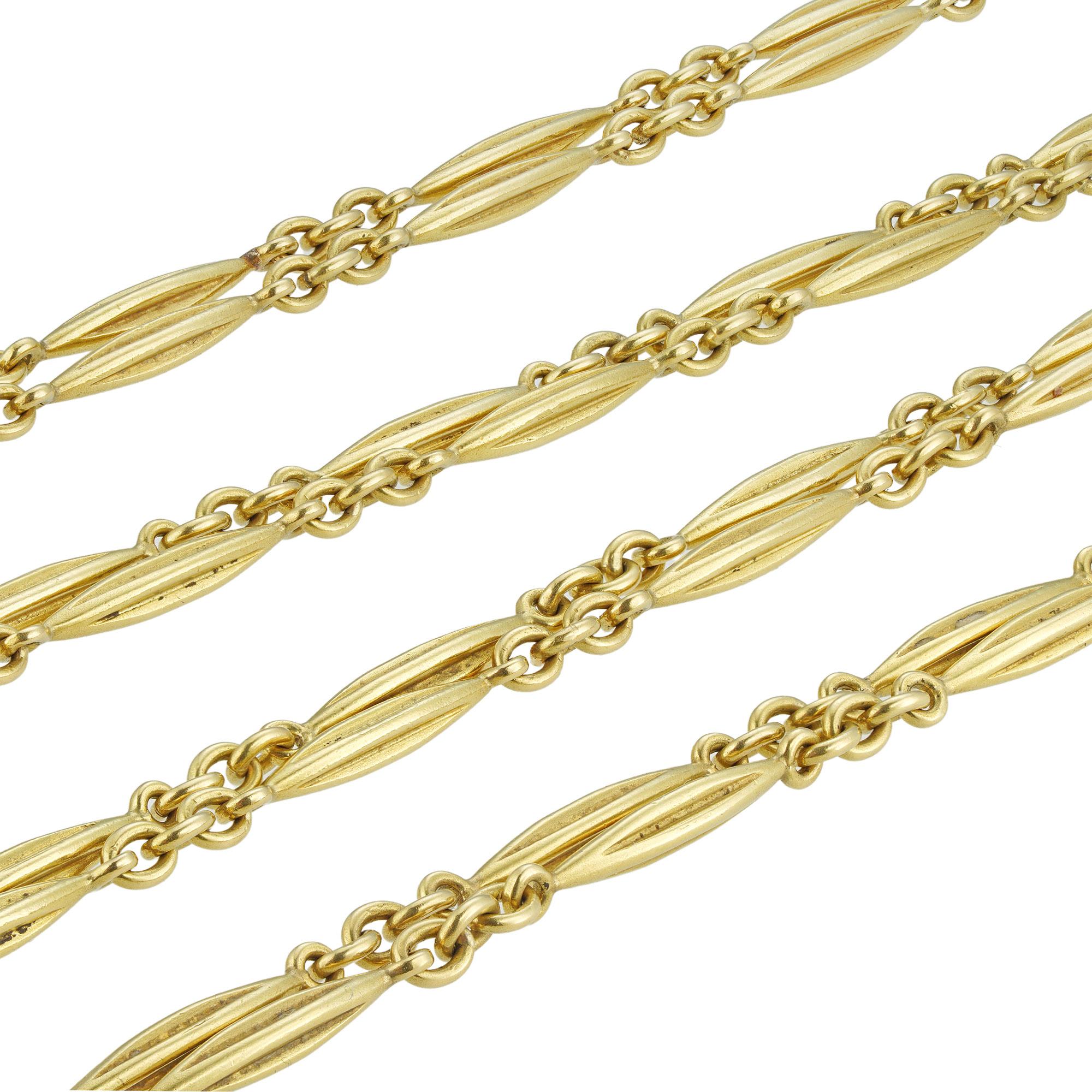 An early 20th century French gold chain/necklace, consisting of fifty-nine torpedo-shaped links connected with oval trace links, to a bolt ring clasp, bearing French gold marks for 18ct gold, circa 1900, measuring 132 x 0.3cm, gross weight 40.4