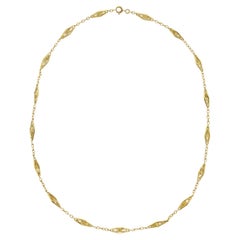 Eine französische Halskette aus dem frühen 20. Jahrhundert mit einer Kette aus ausgefallenen Goldgliedern