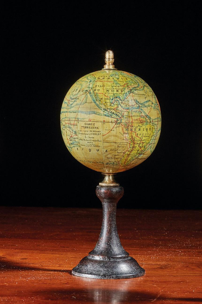 SHIPPING POLICY:
No additional costs will be added to this order.
Shipping costs will be totally covered by the seller (customs duties included). 

Study globe
Polar mounting on a blackened wooden base. Signed J. FOREST in Paris.
France, late 19th
