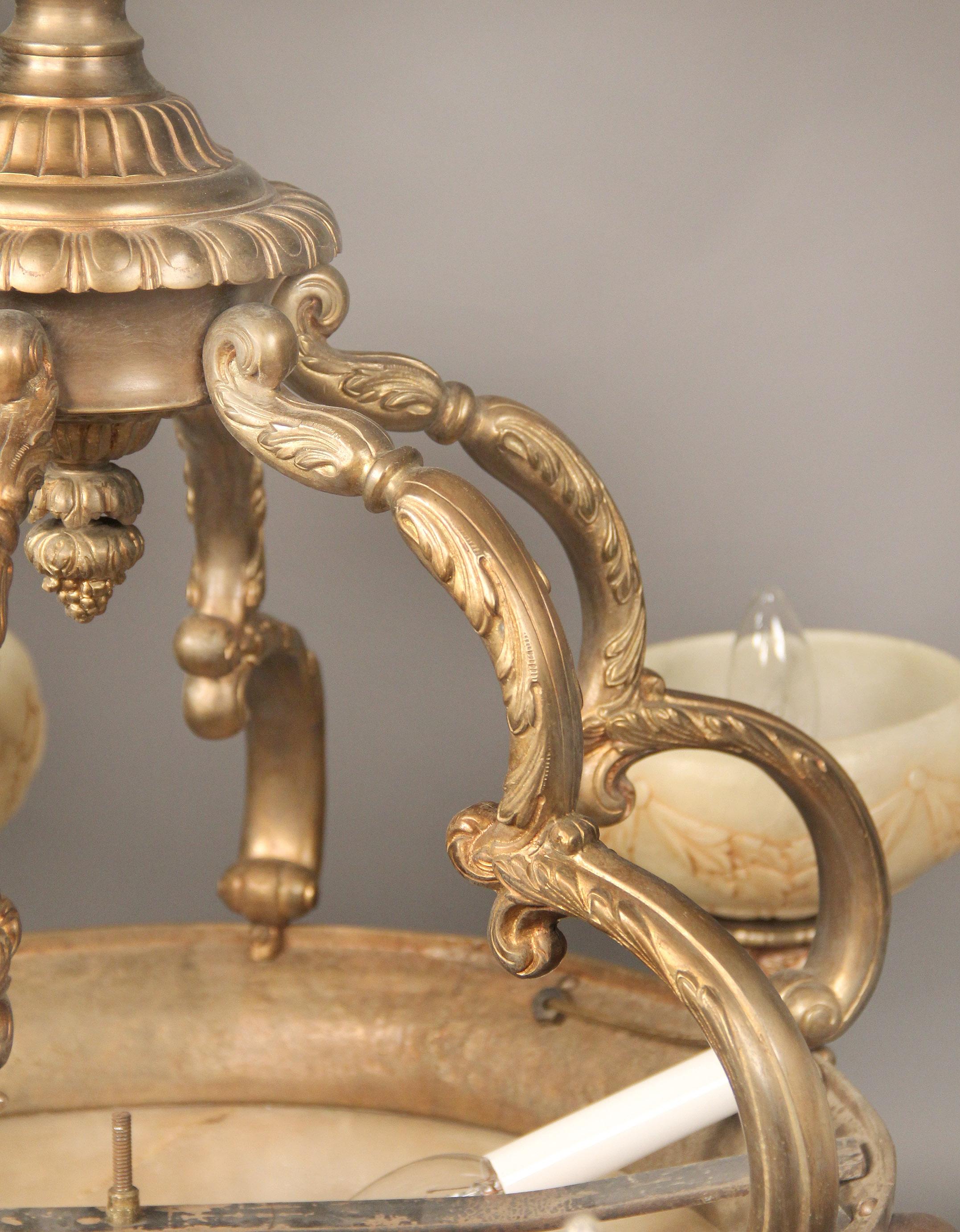 Belle Époque Early 20th Century Gilt Bronze and Carved Alabaster Nine-Light Chandelier For Sale