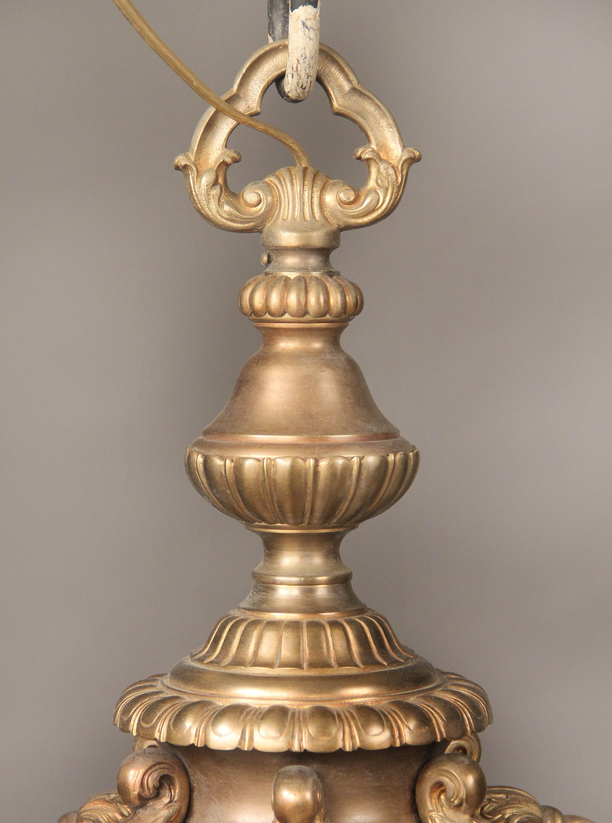 French Early 20th Century Gilt Bronze and Carved Alabaster Nine-Light Chandelier For Sale