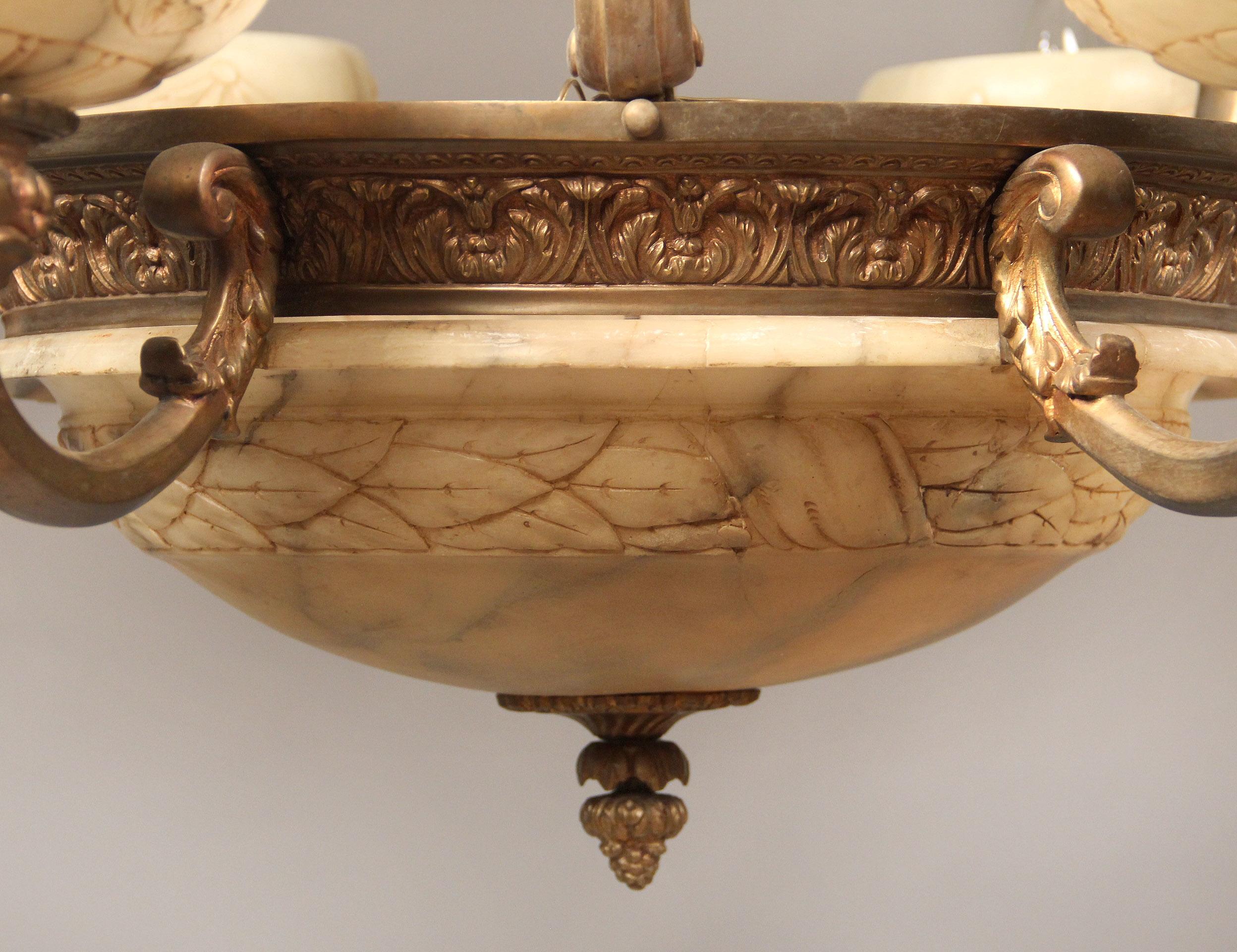 Early 20th Century Gilt Bronze and Carved Alabaster Nine-Light Chandelier In Good Condition For Sale In New York, NY