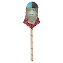 An Early 20th Century Harlequin Moonstone And Ruby Stick-pin