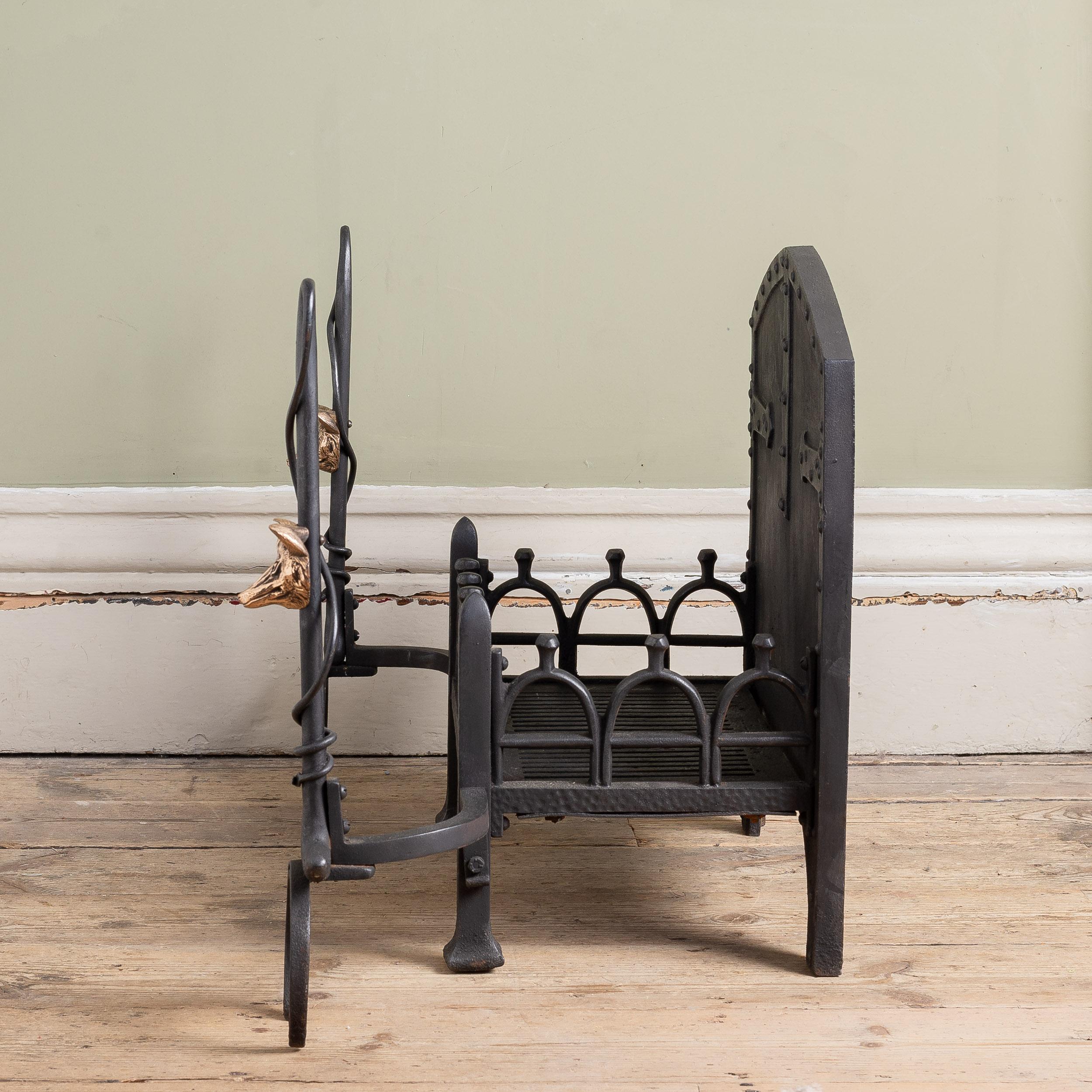 European An Early 20th Century Iron and Bronze Fire Grate For Sale