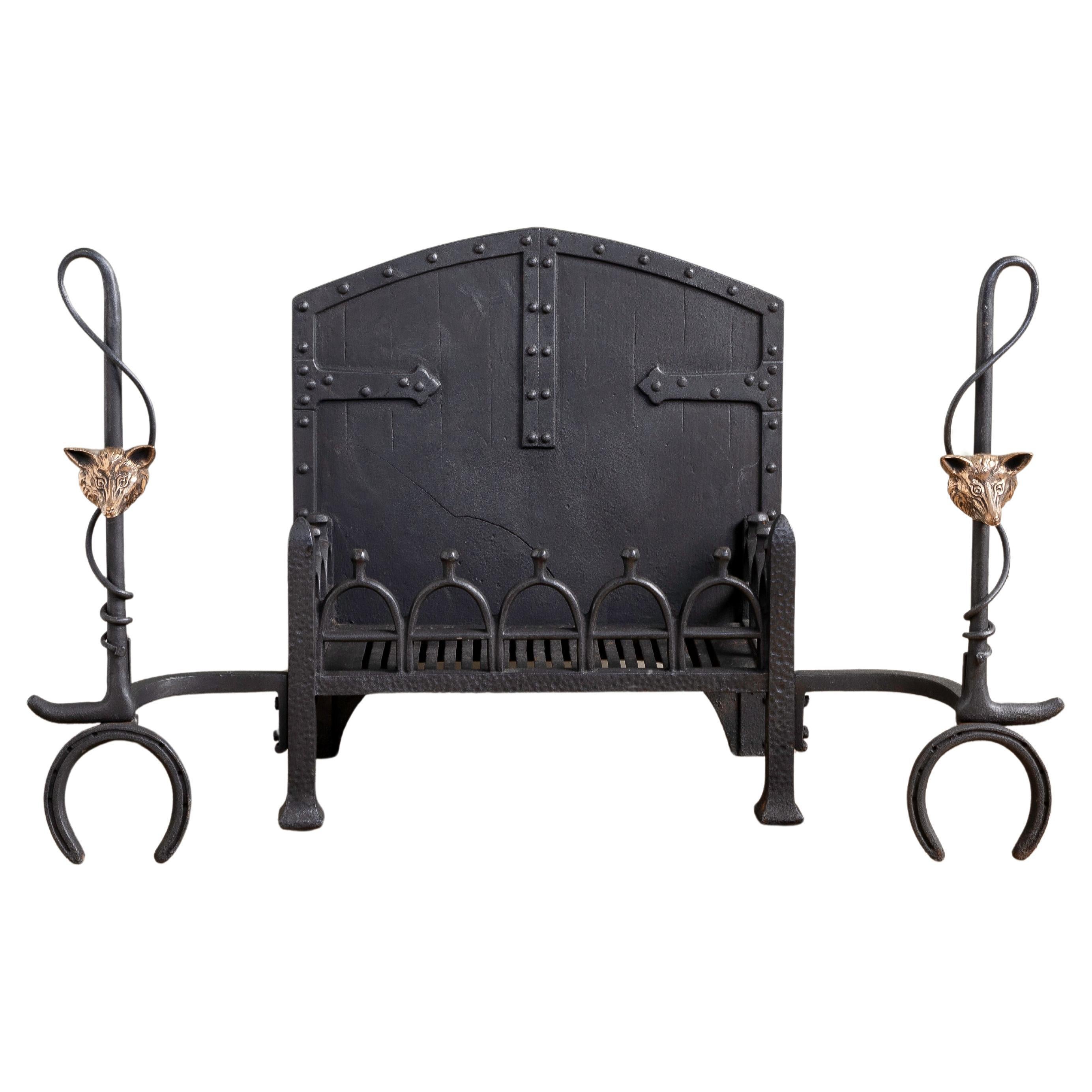 An Early 20th Century Iron and Bronze Fire Grate