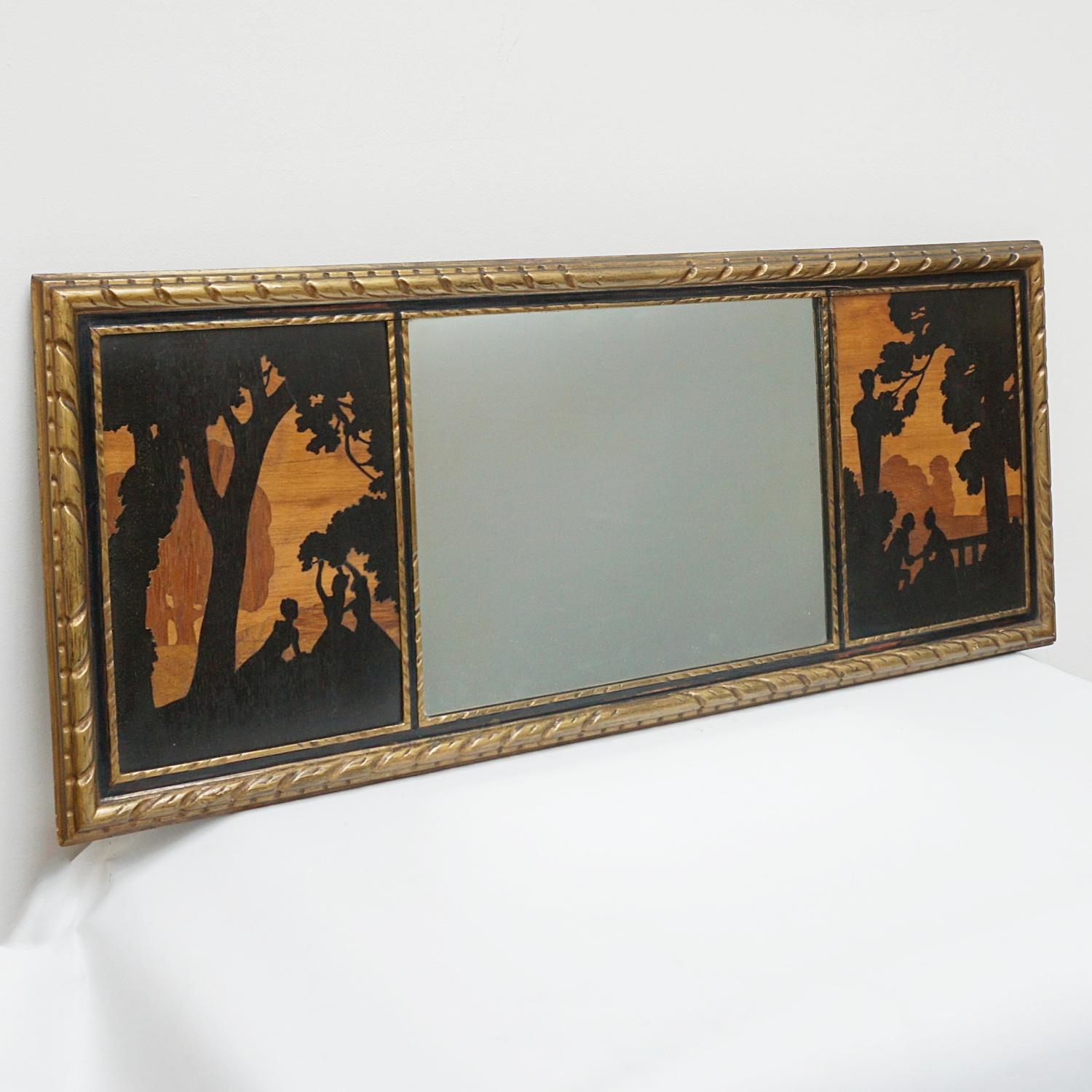 An Arts & Craft's mirror designed by William Chase and Albert James Rowley, produced by the Rowley Gallery. An inlaid wood panel depicting on the left side a group of girls picking fruit from the tree, and on the other side a proposal of engagement