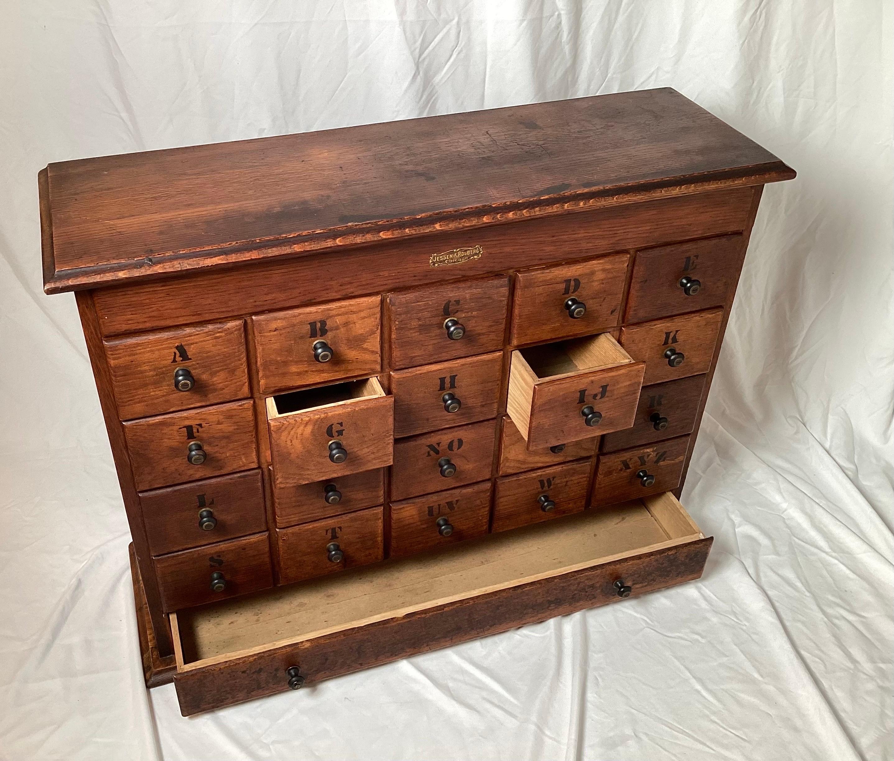 American An Early 20th Century Oak Apothecary Cabinet