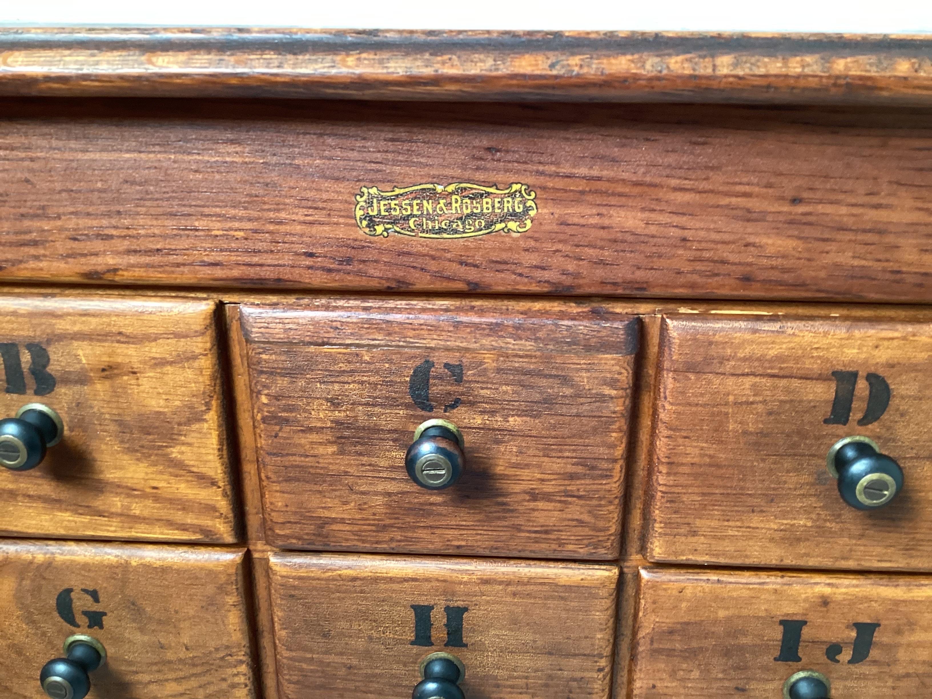 An Early 20th Century Oak Apothecary Cabinet 5