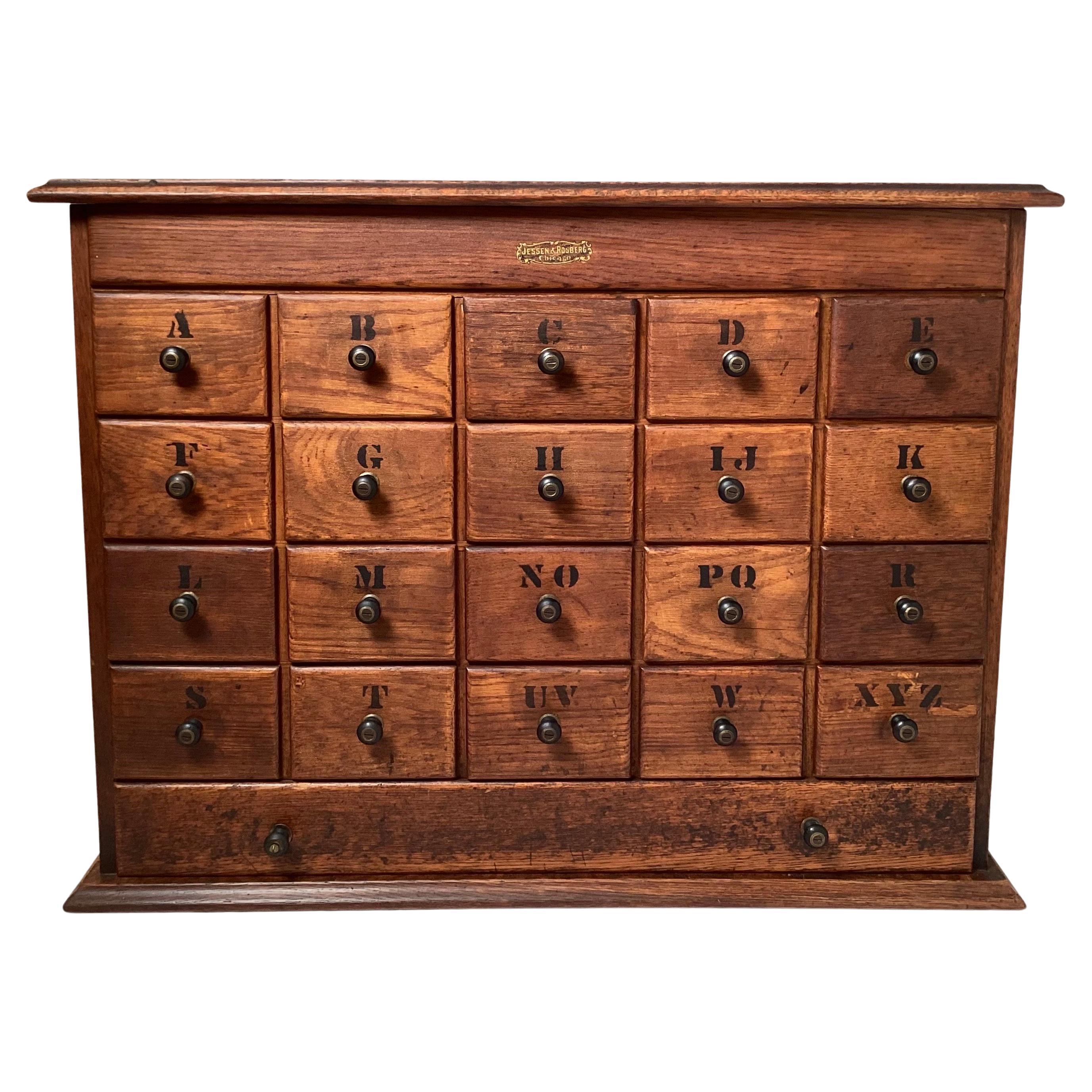 An Early 20th Century Oak Apothecary Cabinet