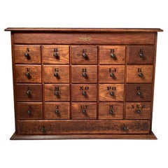 An Early 20th Century Oak Apothecary Cabinet