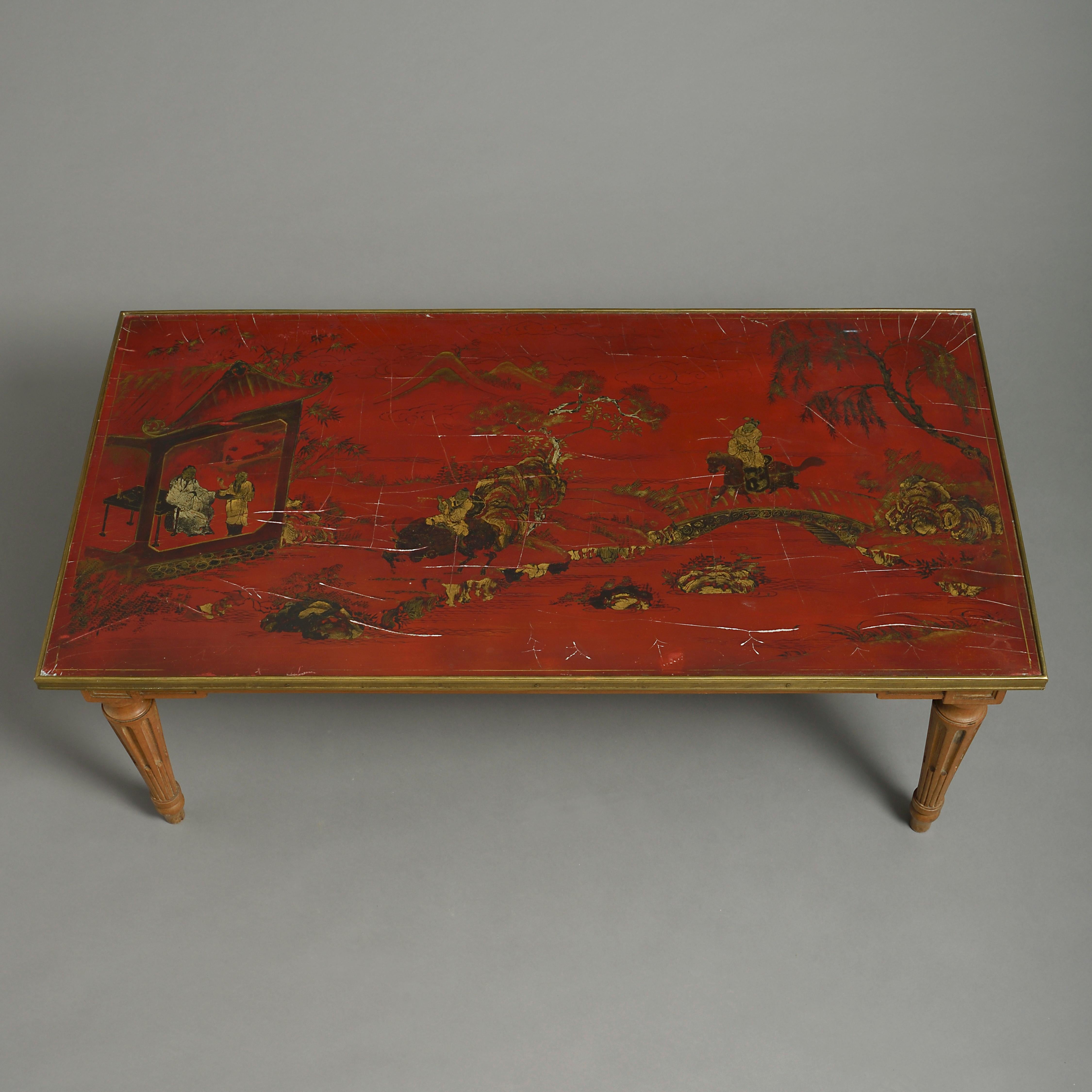 A fine late 19th century rectangular red lacquer panel, decorated with figurative scenes in gilt and polychrome, mounted on a mid-20th century beechwood base in the Louis XVI manner, as a low table.

The wooden table base was clearly made in the
