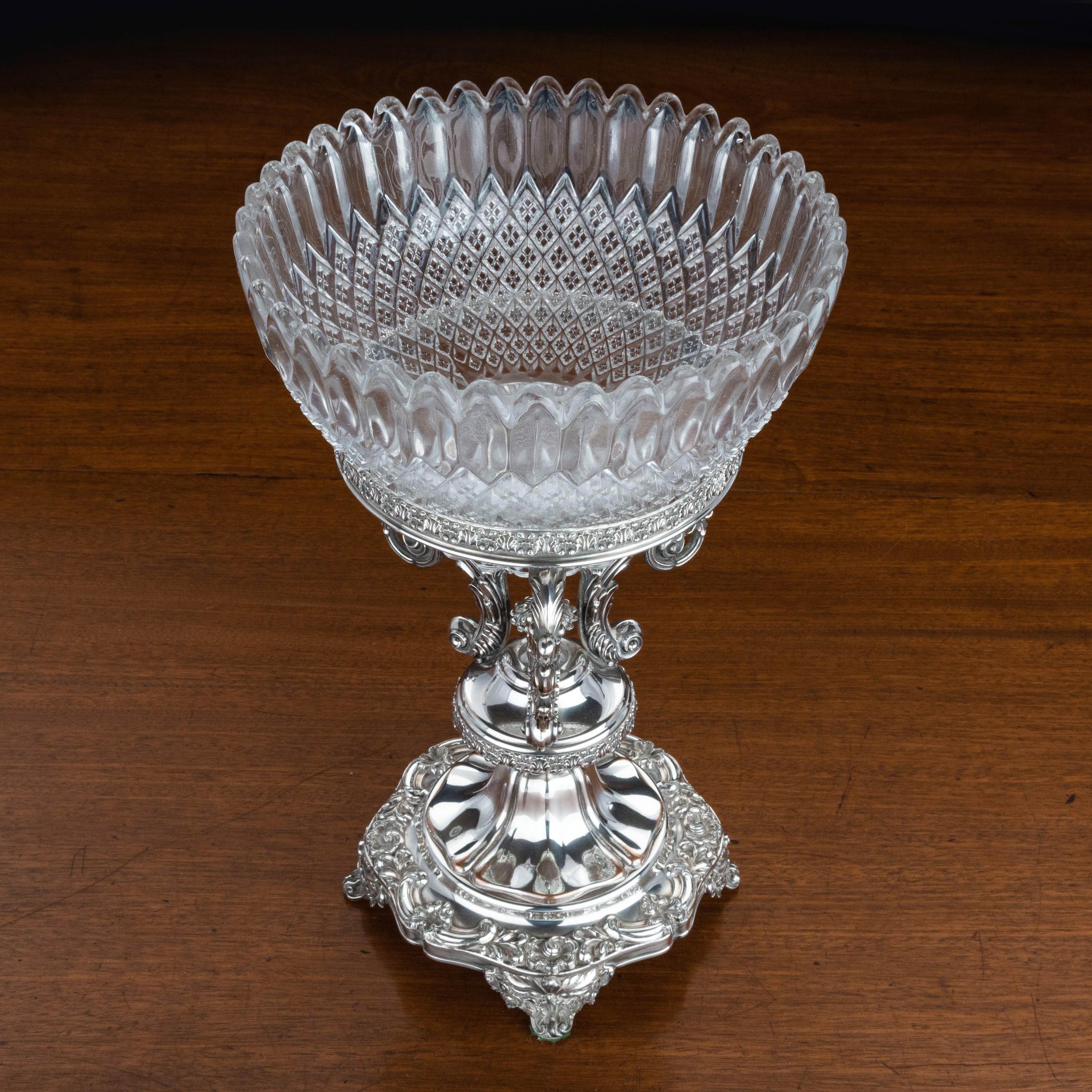 An early 20th century silver plated syphon holder. With an elaborately cast and pierced border. Original surface.