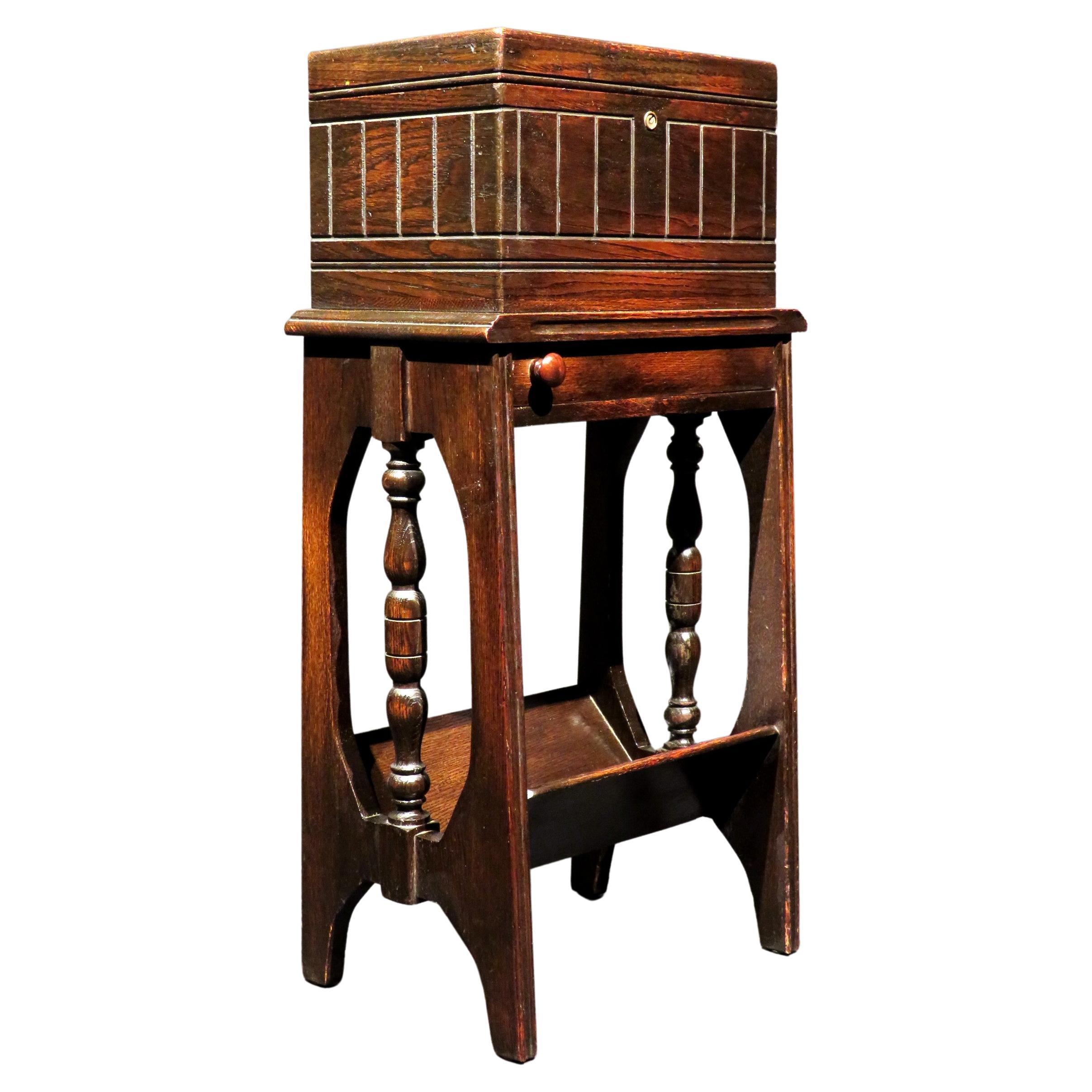 An Early 20th Century Cigar Humidor / Smokers Stand & Book Rack in Oak For Sale
