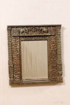 Miroir en bois du début du XXe siècle avec sculptures à motifs d'éléphants et de feuillages, Inde