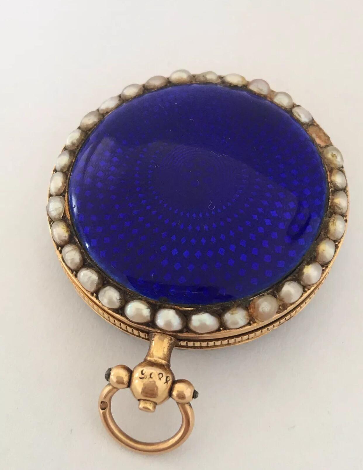Blue Enamel & Gold Full Hunter Cased Fob Watch signed Champion A’ Paris For spares or repair.


This beautiful fob watch is not working and the balance in broken (not spinning) 4 seeds pearl missing, minute hand missing, front cover enamel is darker