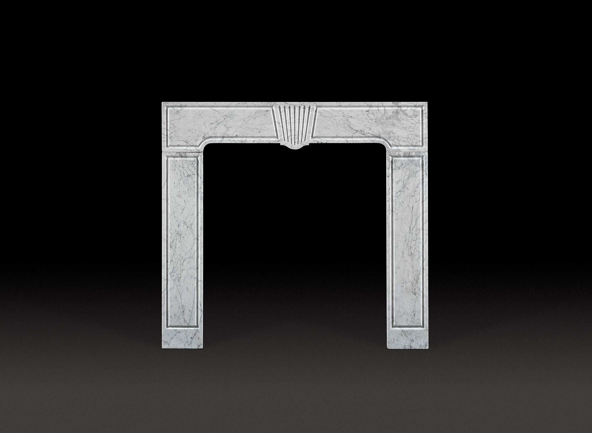 An Early 18th Century Carrara Marble Fireplace.

The frieze decorated with a central keystone with graduated flutes, the sides and jambs with simple incised geometric mouldings. Circa 1710.

See 'Georgian Chimneypieces', Georgian Group, Neil Burton,