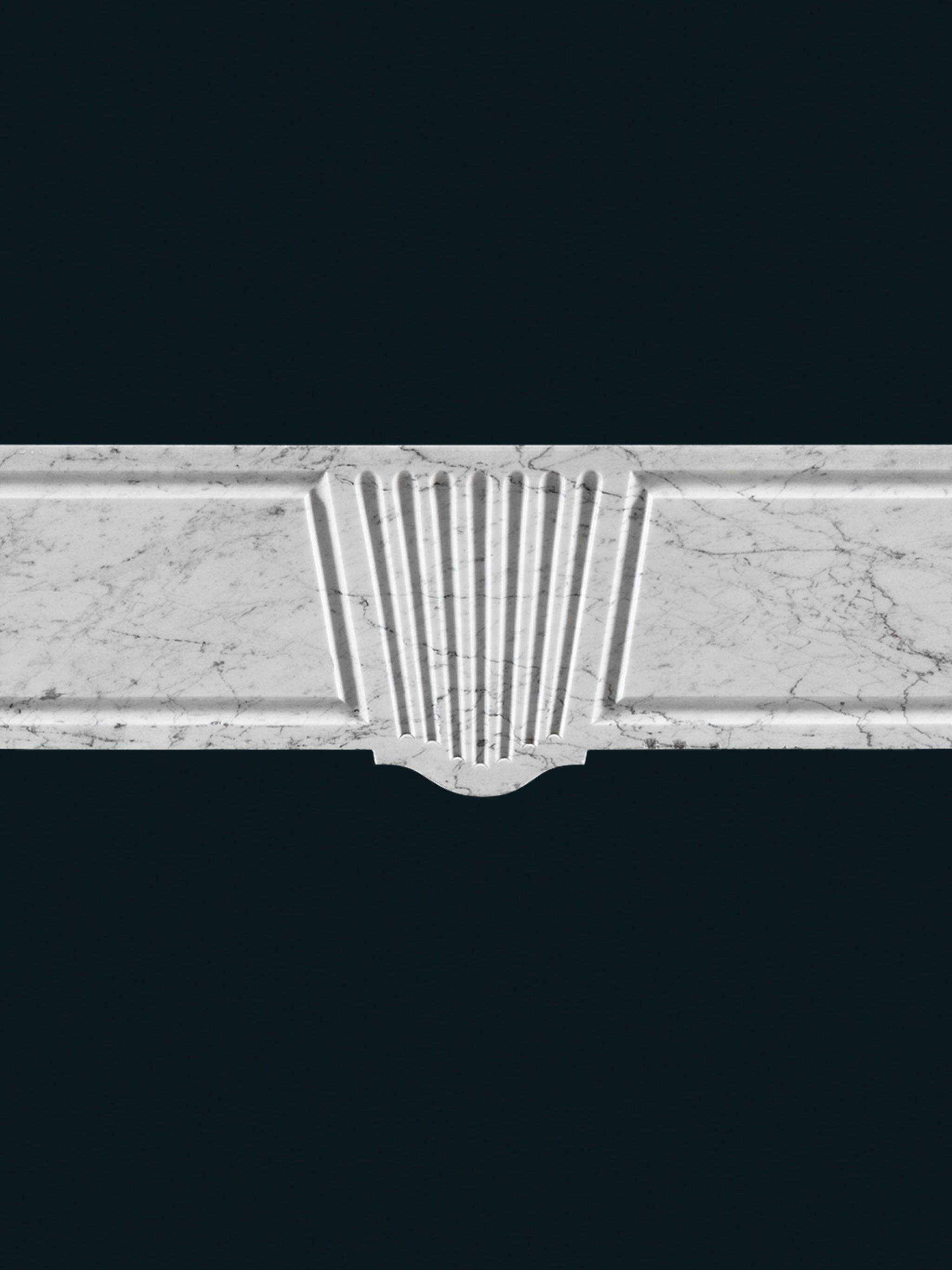 Georgian An Early Eighteenth Century Carrara Marble Fireplace of Geometric Form For Sale