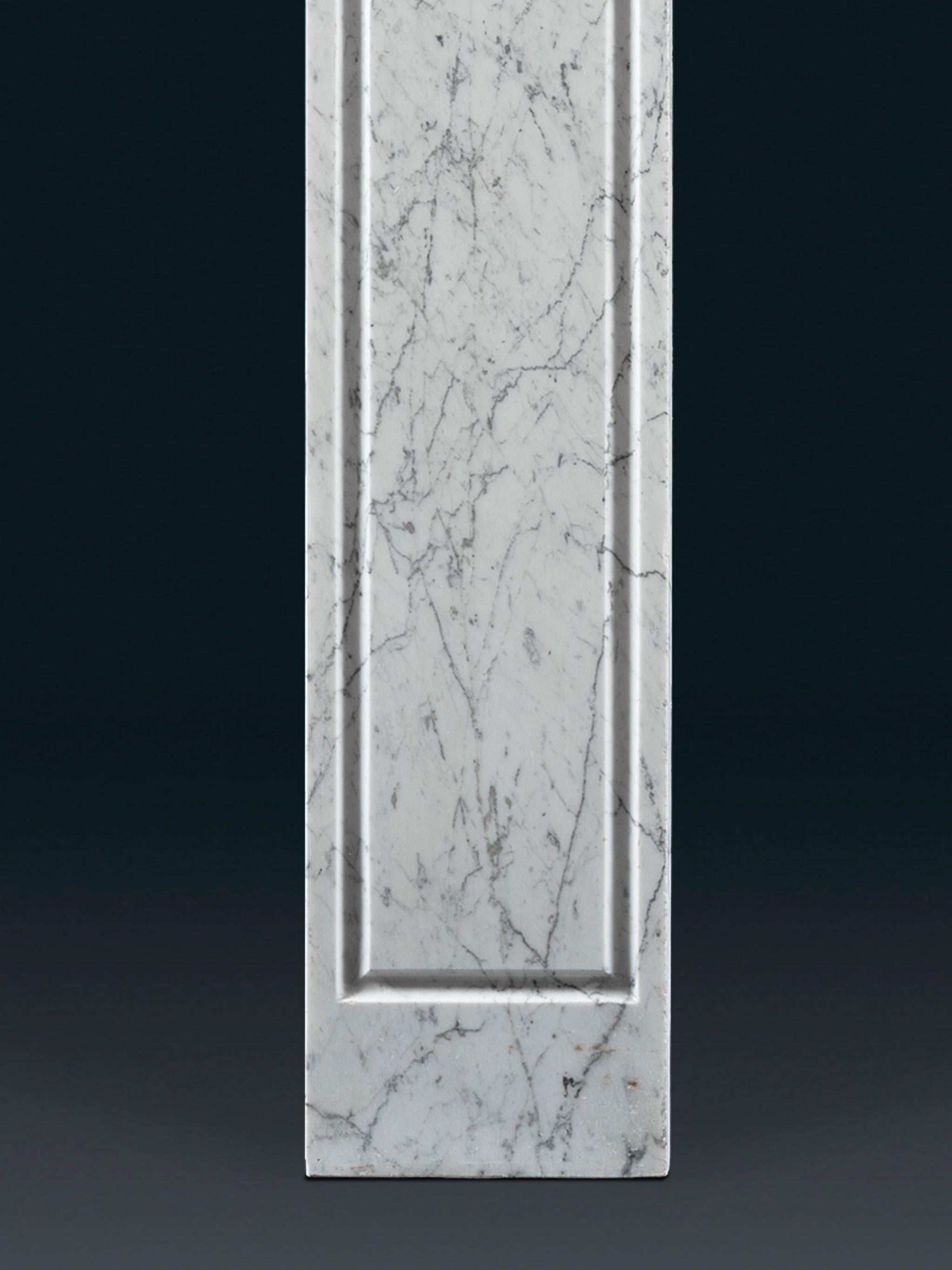 18th Century An Early Eighteenth Century Carrara Marble Fireplace of Geometric Form For Sale