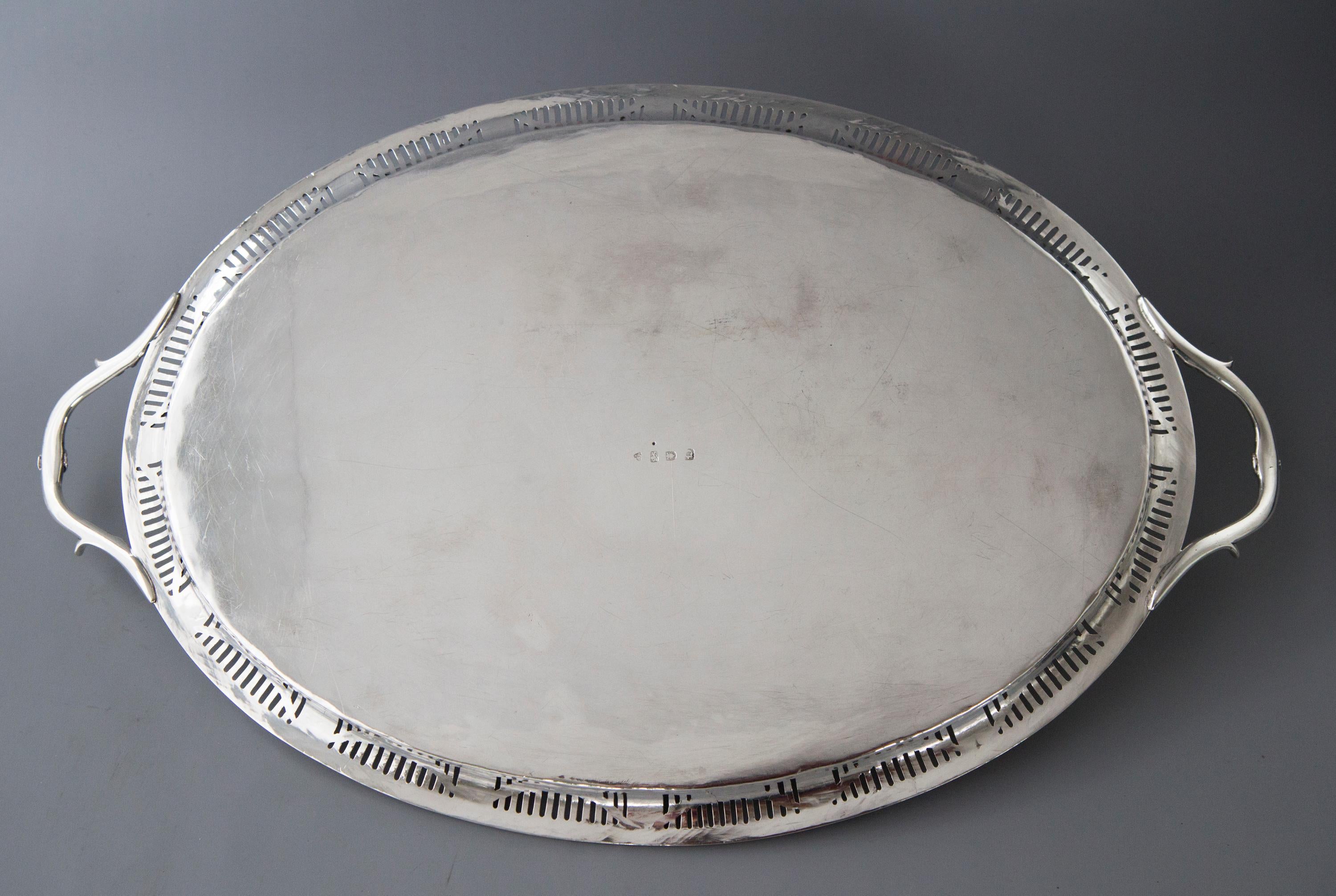 A very fine quality George III oval silver tray with pierced gallery and beaded edges with floral swag and urn classical decoration.

Clearly hallmarked to the underside for London 1769 by Thomas Heming.

This is an exceptionally fine tray by