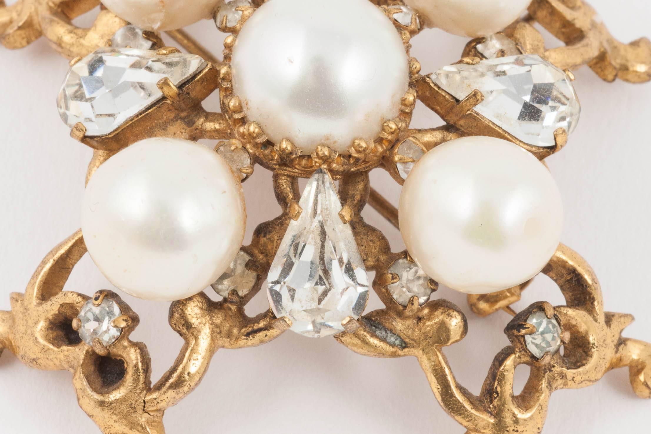 Baroque An early handmade gilt metal, pearl and paste 'cruciform' brooch, Chanel , 1950s
