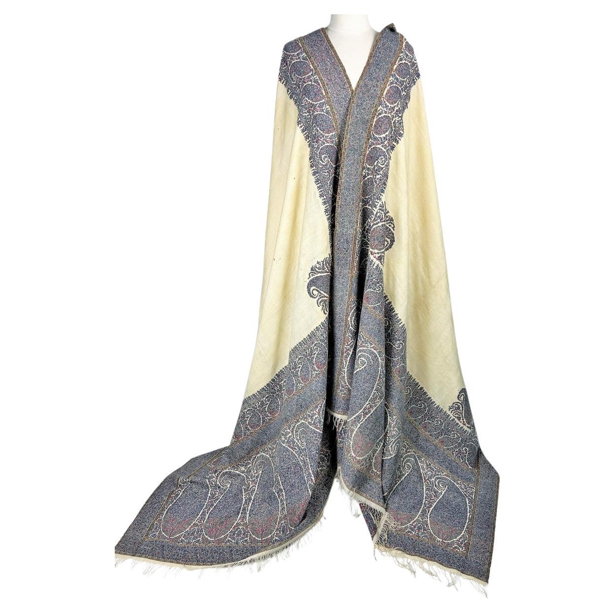 Circa 1810/1820
India for export to Europe
A rare Kani hand-woven Indian Kashmir shawl with cream pashmina reserve dating from the beginning of the shawl fashion in France around 1810. Kani shawl woven in six colours using tapestry point stitch by