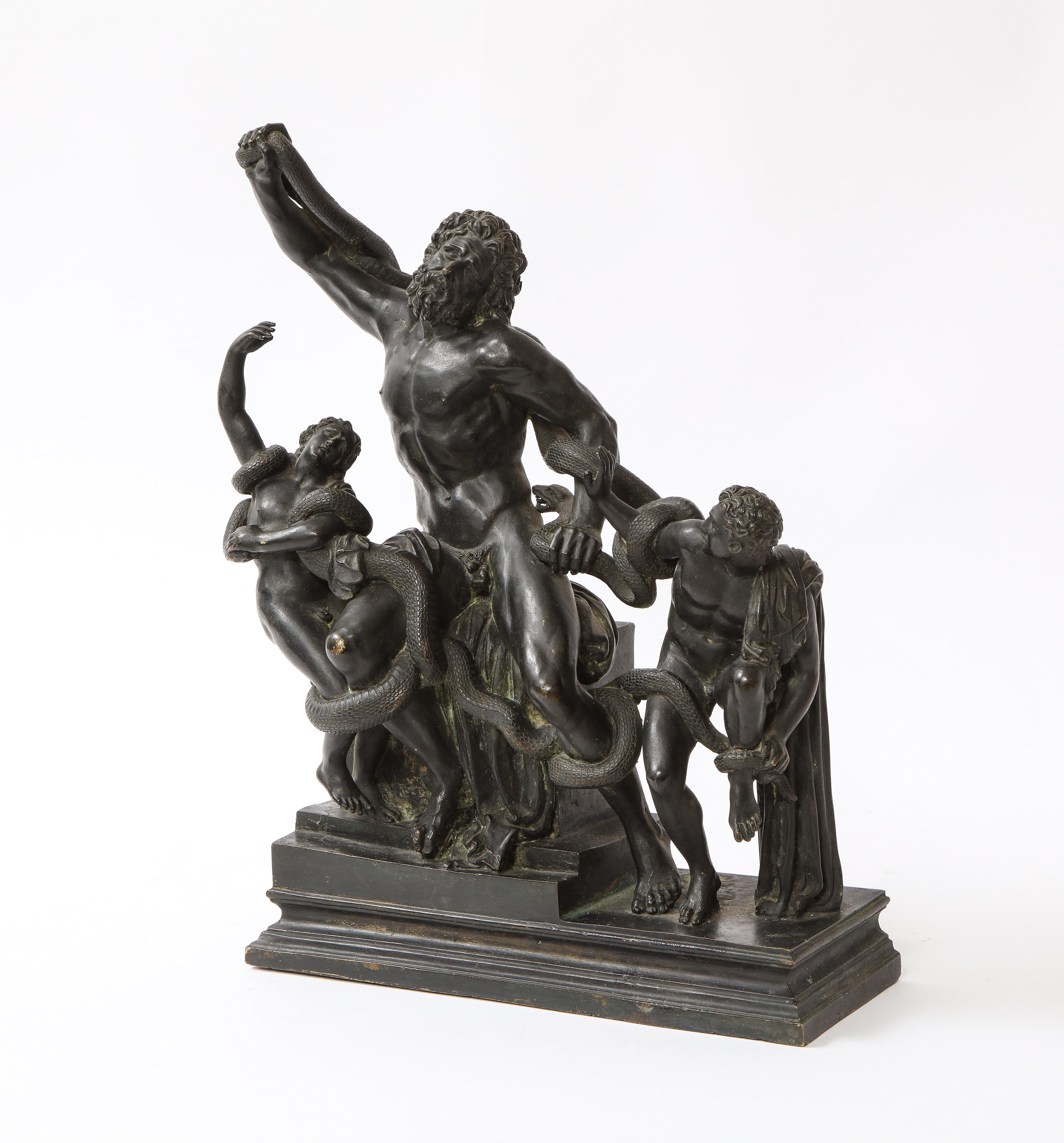 A Marvelous and Pristine Condition Italian Early Example, Late 17th to Early 18th Century Patinated Bronze Model of Laocoön.  This piece is marvelously cast, hand-chassed, and hand-chiseled with the finest detail.  The patina is original from the