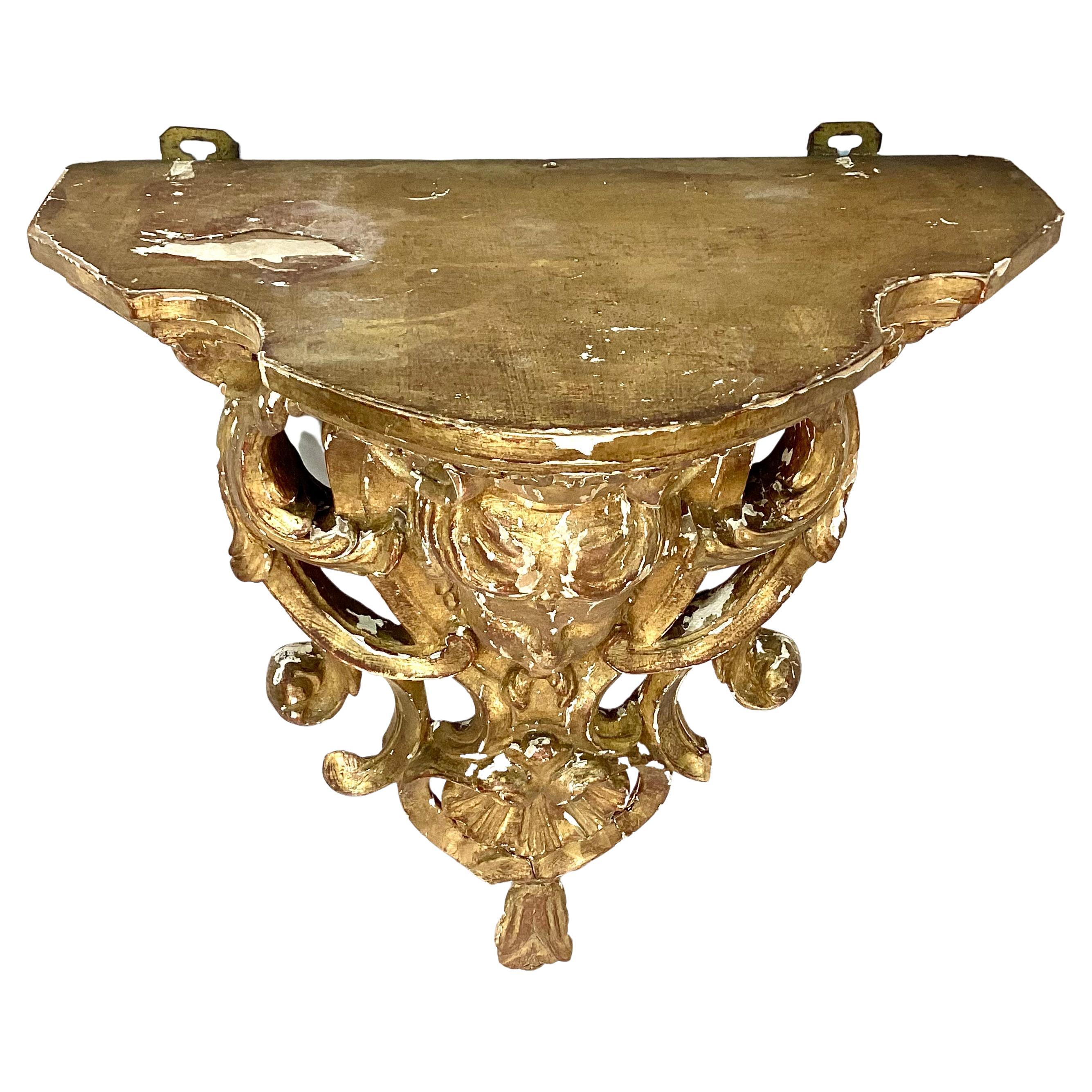 An Early Louis XV Carved And Giltwood Wall Bracket In Good Condition For Sale In Bradenton, FL