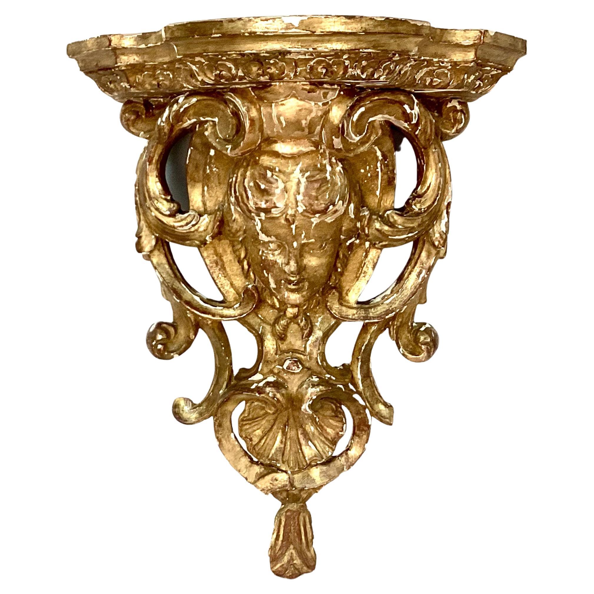 An Early Louis XV Carved And Giltwood Wall Bracket For Sale