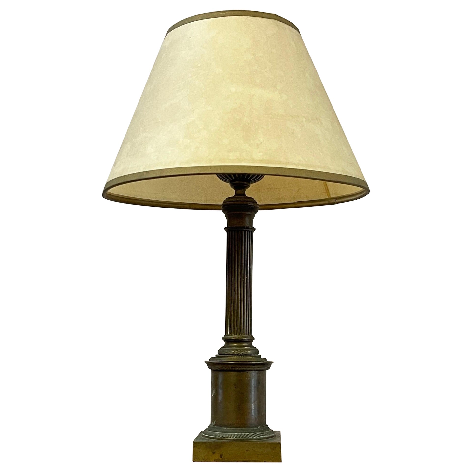 An early nineteenth century brass column lamp For Sale