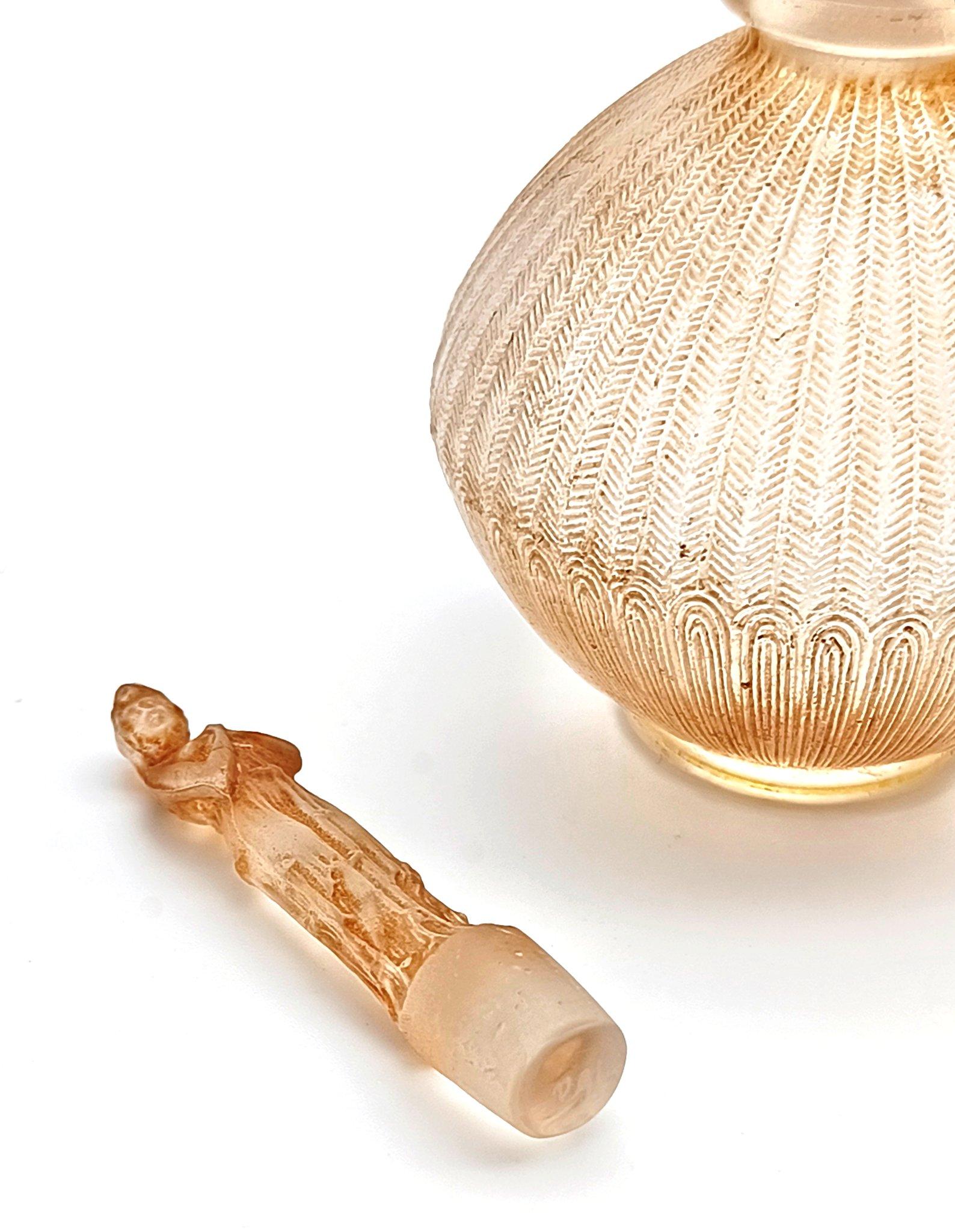 Lucidato Bottiglia di profumo in vetro di René Lalique 
