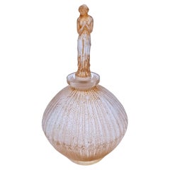 An early René Lalique glass perfume bottle "Roses d’Orsay"