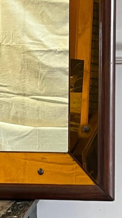 An Early to Mid Twentieth Century Italian Amber Glass Bordered Mirror