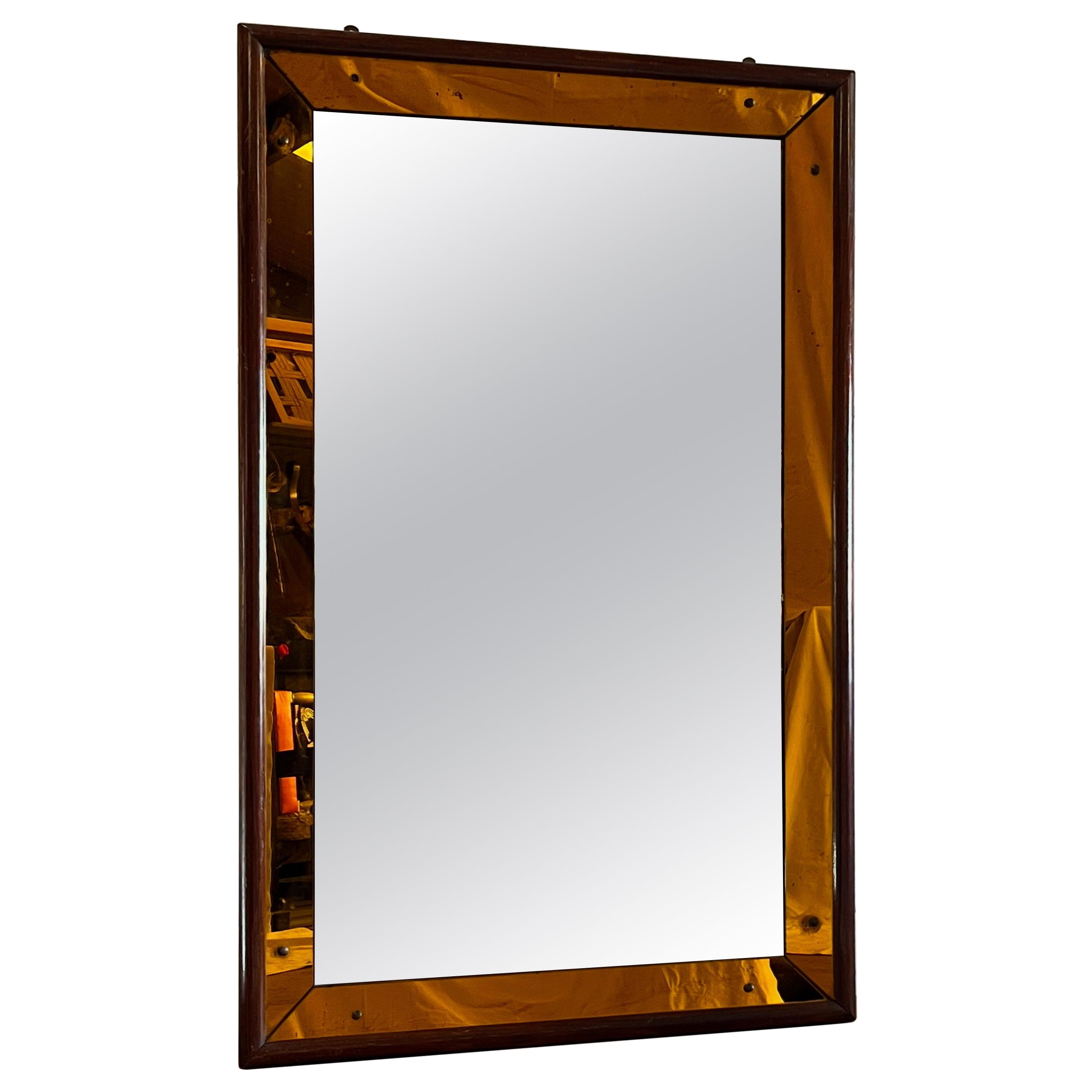 An Early to Mid Twentieth Century Italian Amber Glass Bordered Mirror For Sale