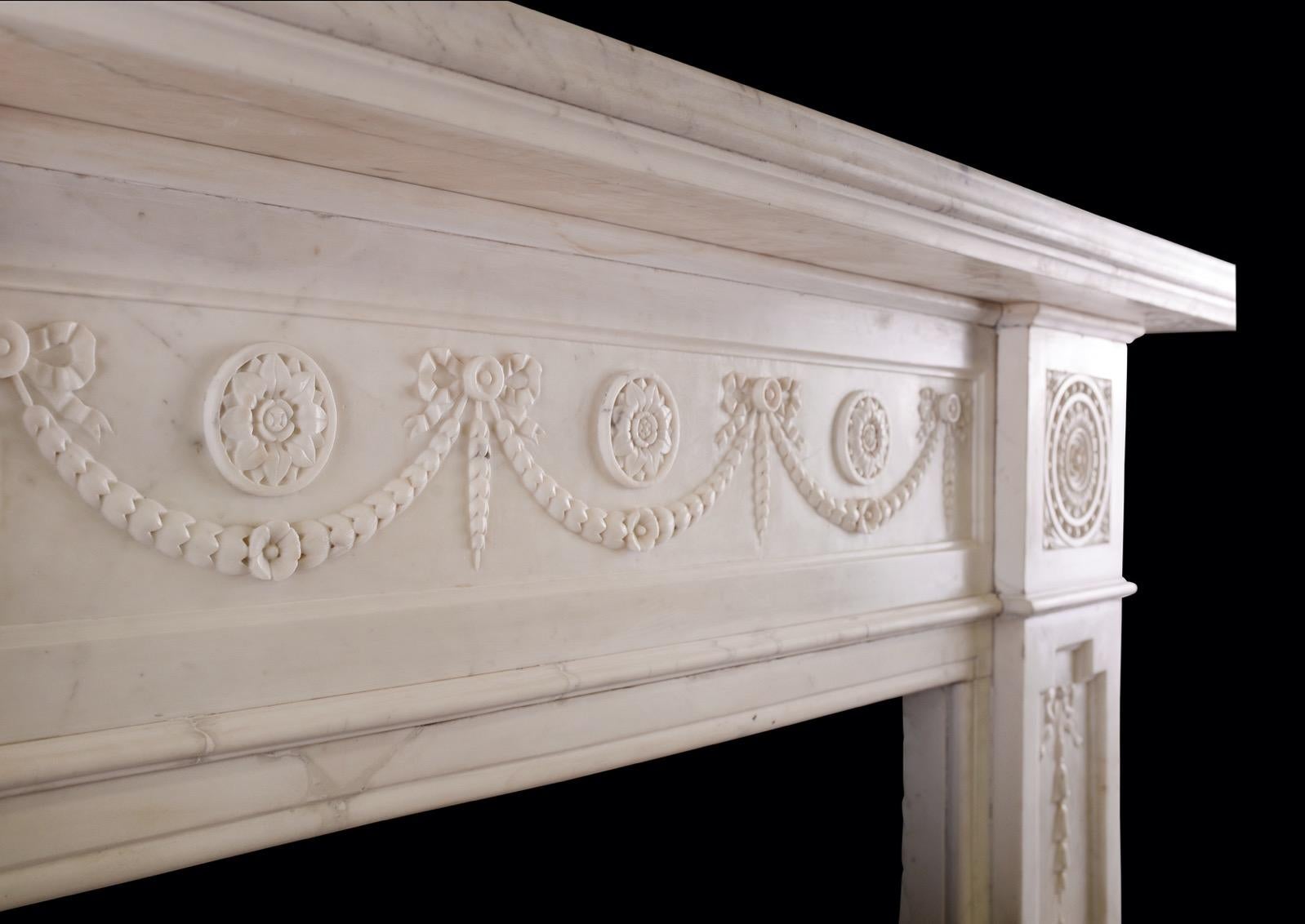 19th Century An Early Victorian Fireplace in White Statuary Marble For Sale