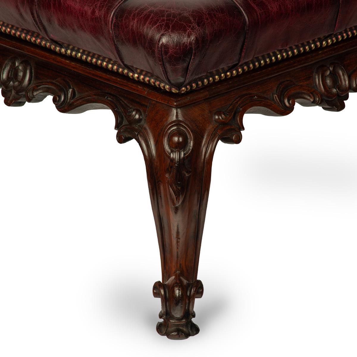 English An early Victorian leather-upholstered rosewood stool For Sale