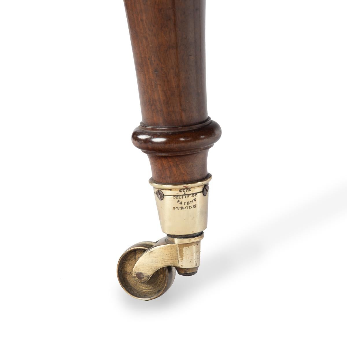 An early Victorian walnut folio stand attributed to Holland & Sons For Sale 1