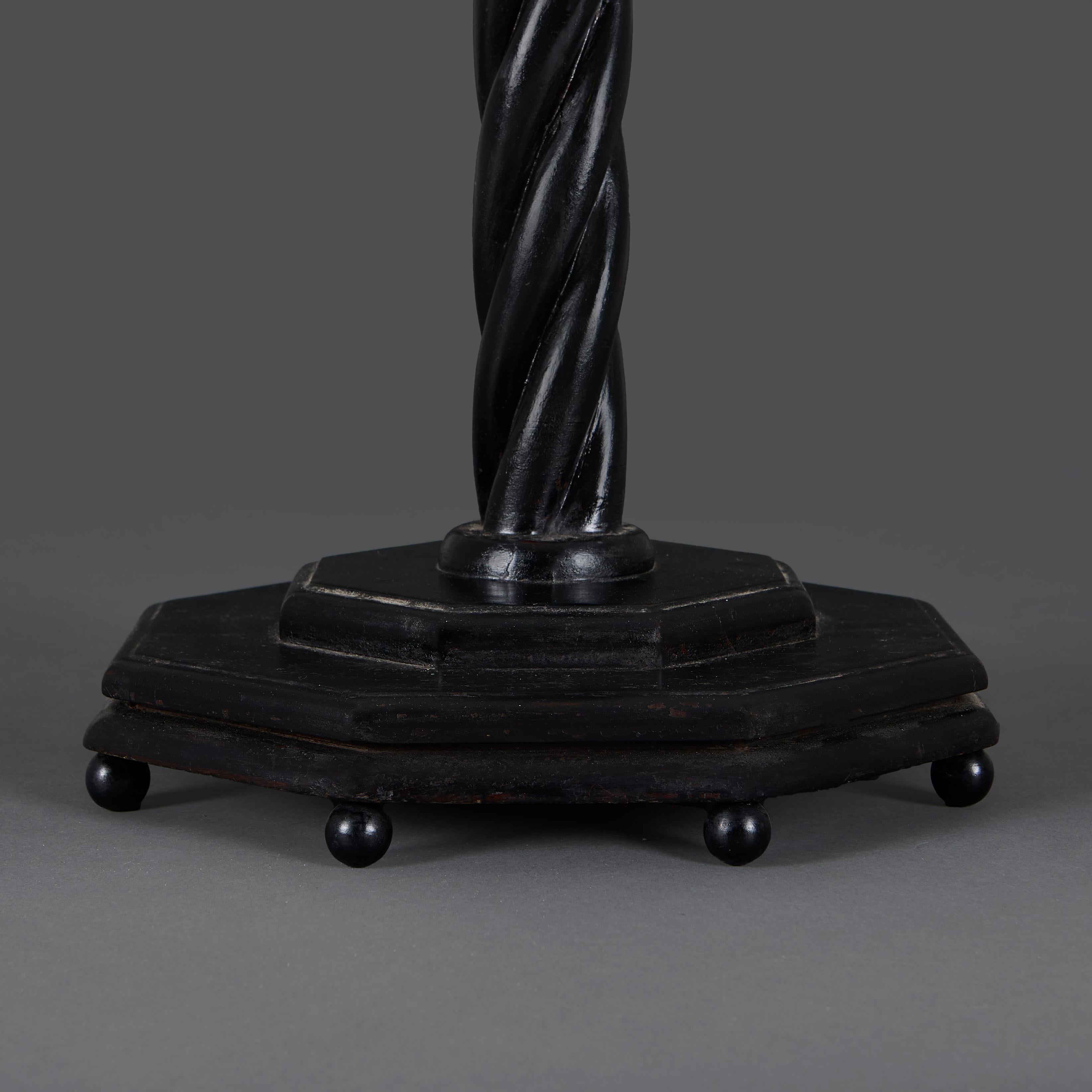 Anglo-Indian An Ebonised Twisted Floor Lamp For Sale
