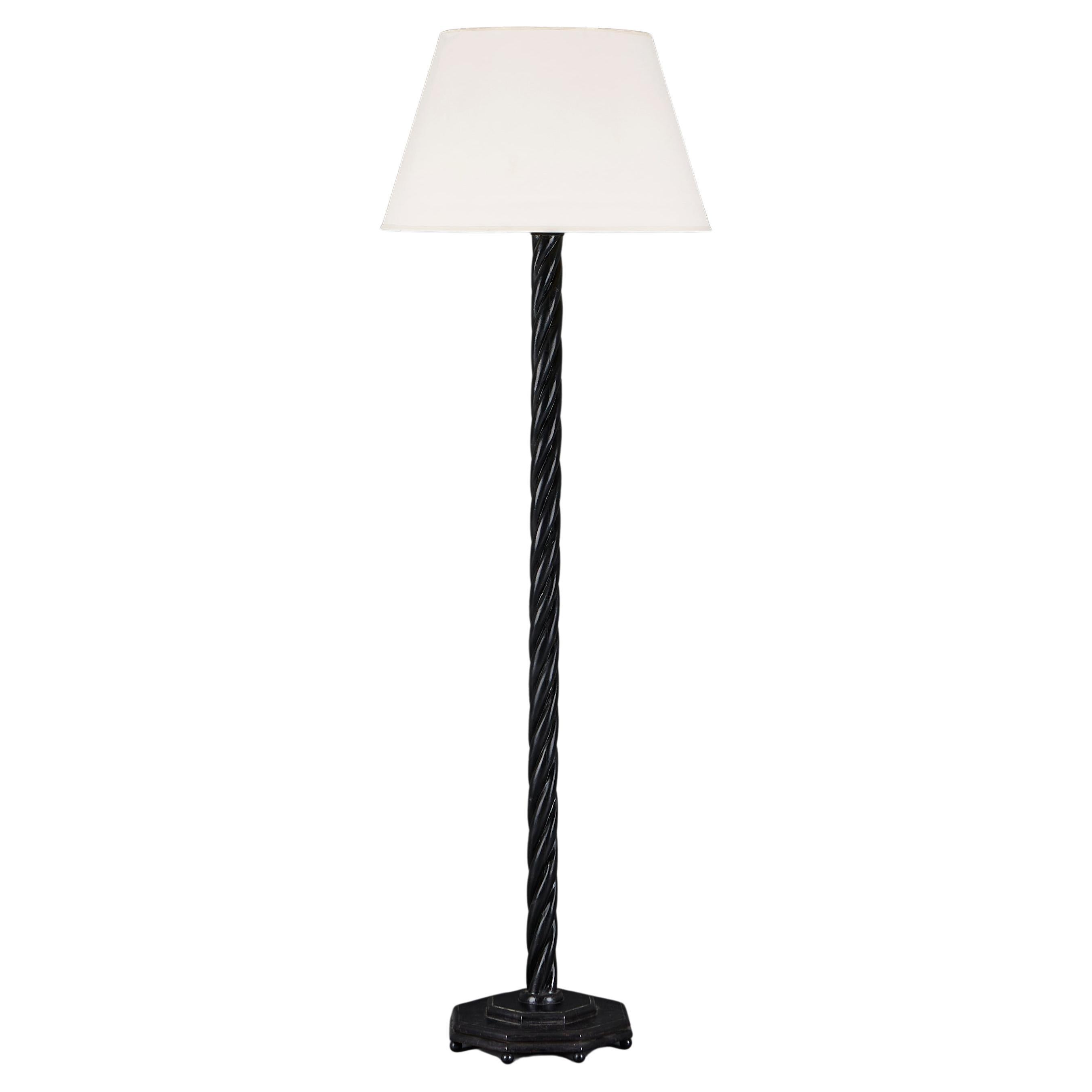 An Ebonised Twisted Floor Lamp For Sale