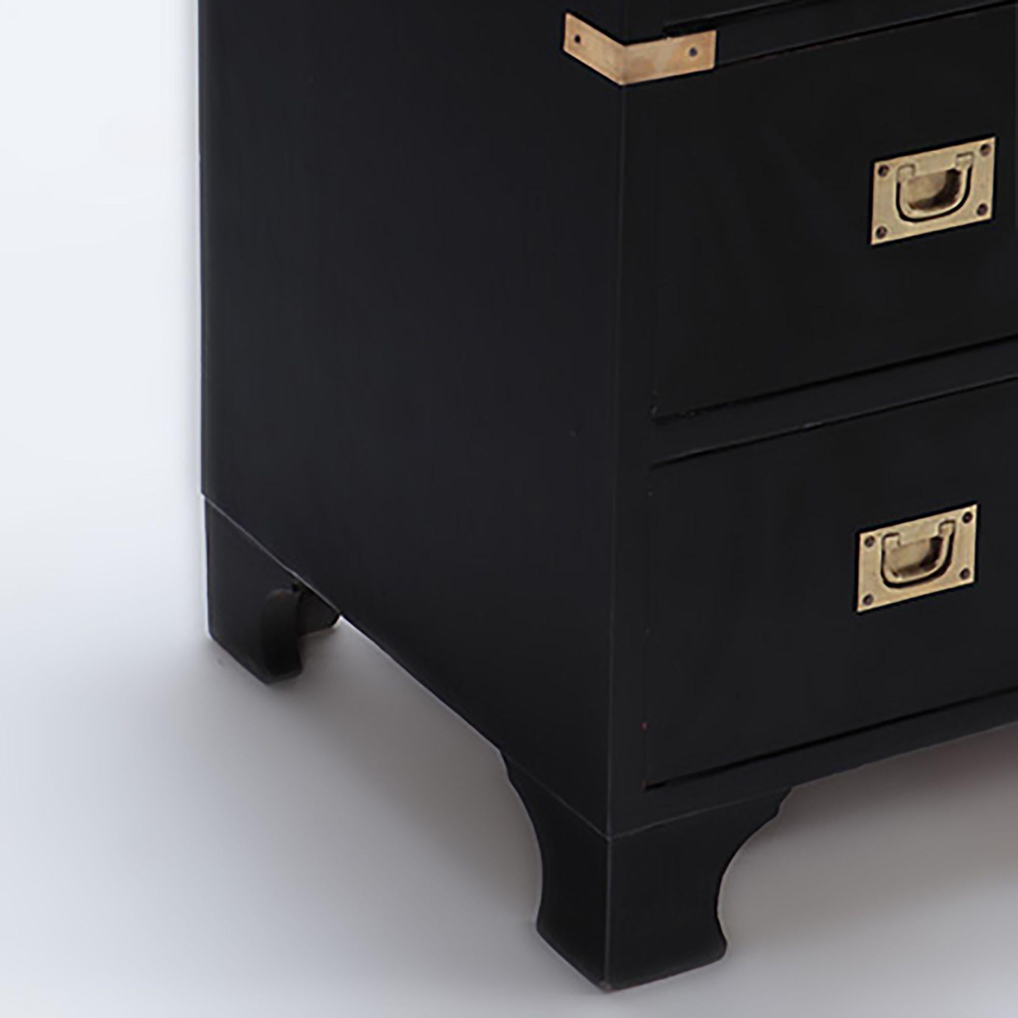 An ebonized mahogany three drawers brass mounted campaign style chest, circa 1940.