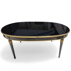 An Ebonized Dining Table, Attributed to Maison Jansen