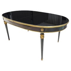An Ebonized Dining Table, Attributed to Maison Jansen