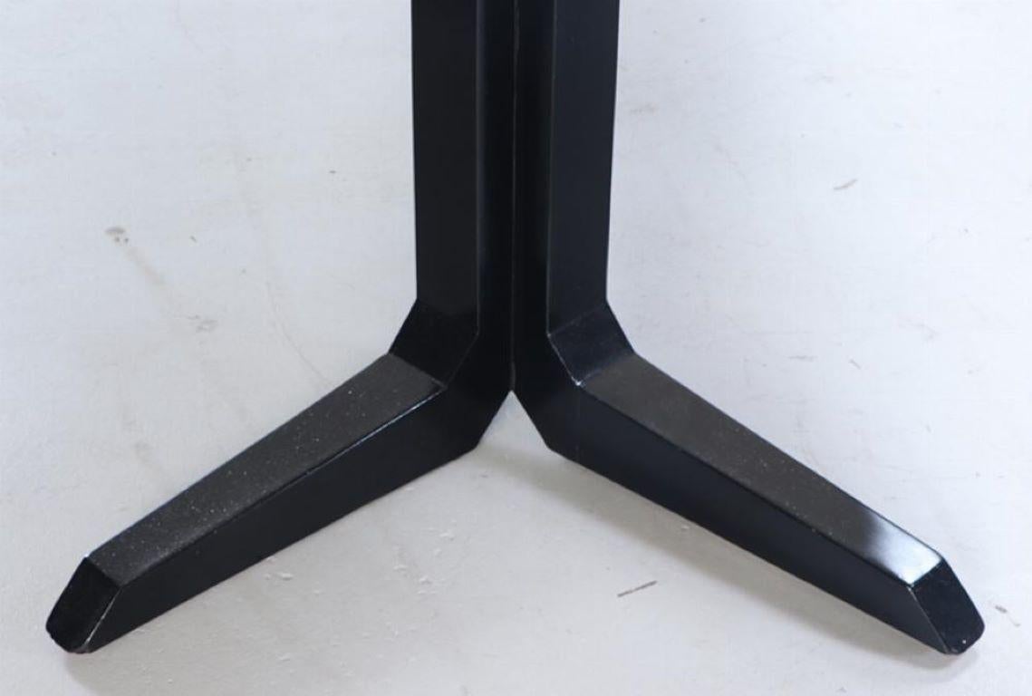 An ebonized marble top dining table circa 1960. In Good Condition For Sale In Philadelphia, PA